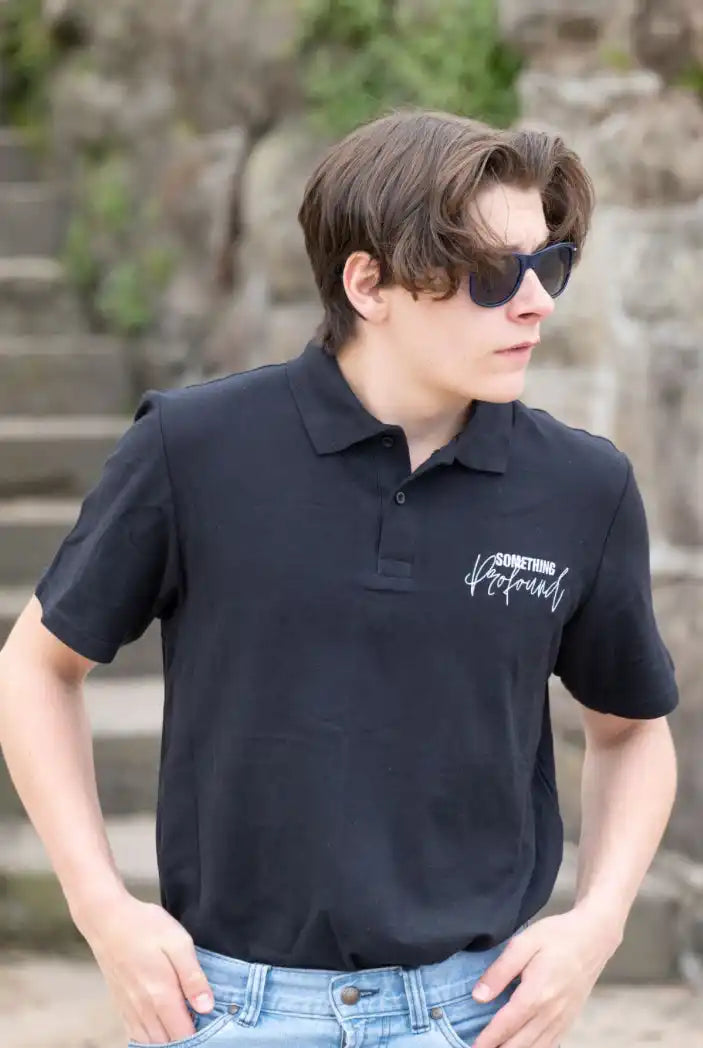 Black polo shirt.